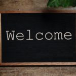 Welcome written on chalk blackboard